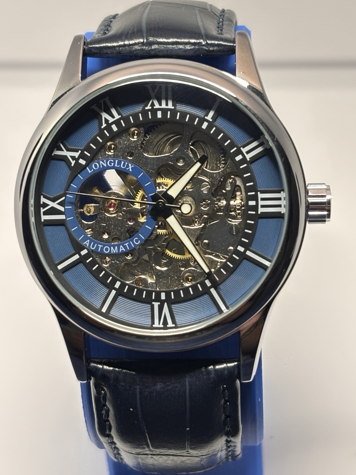 Longlux Automatic Skeleton Dial Roman Numerals Blue Leather Strap SS Watch