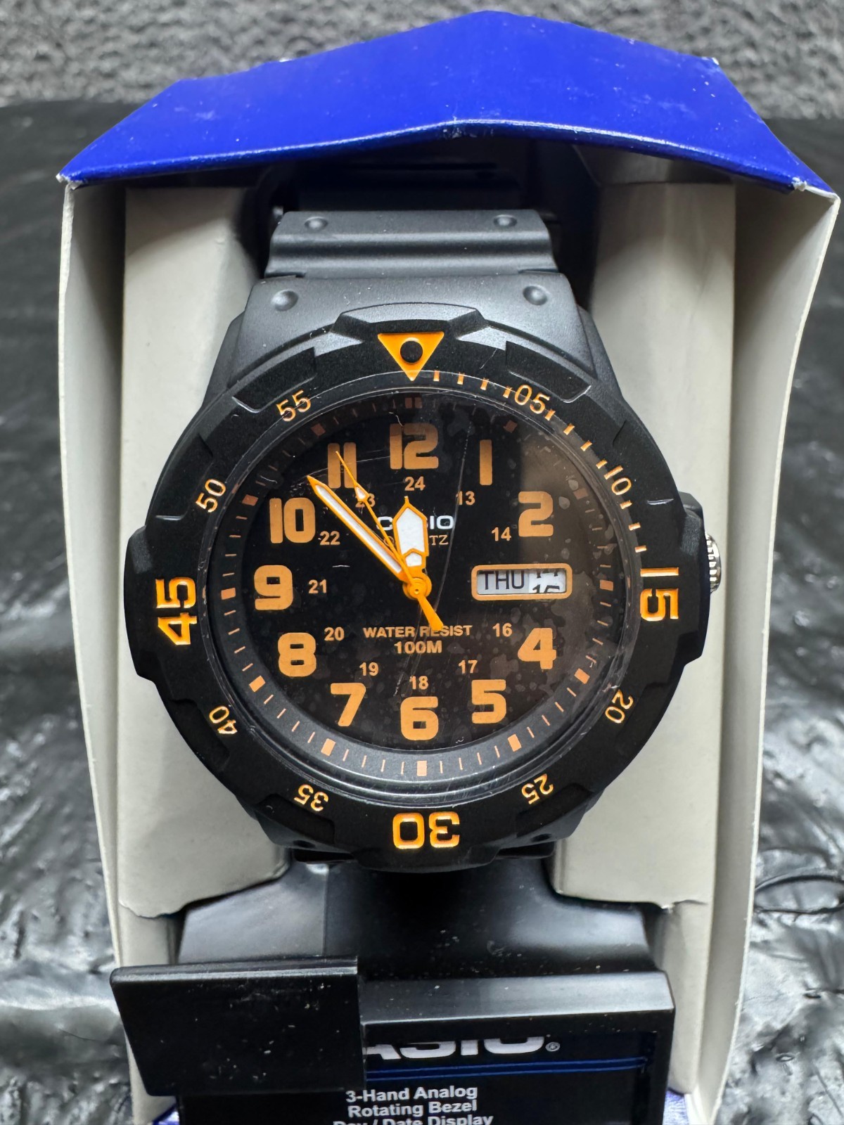 Casio MRW200H-4BV Analog Watch Orange Dial Black Resin Band Unisex – Open Box