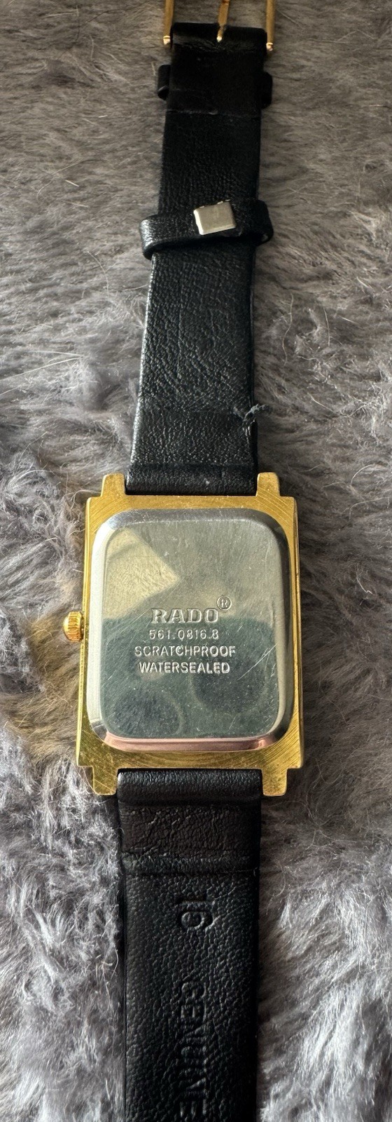 Rado Jubilé Quartz Rectangle Black Dial Date Gold Tone Case Black Leather Strap