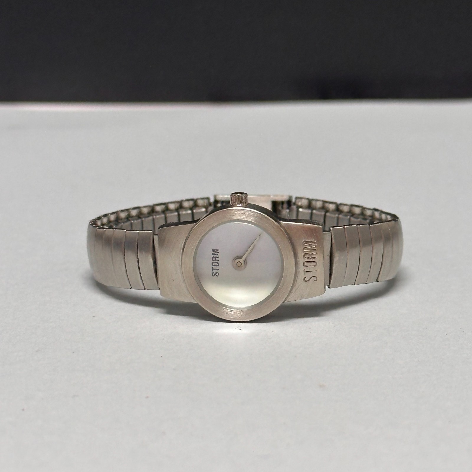 Storm Watch Women Silver Tone Stretch Band Small Round 19MM Dial 6″