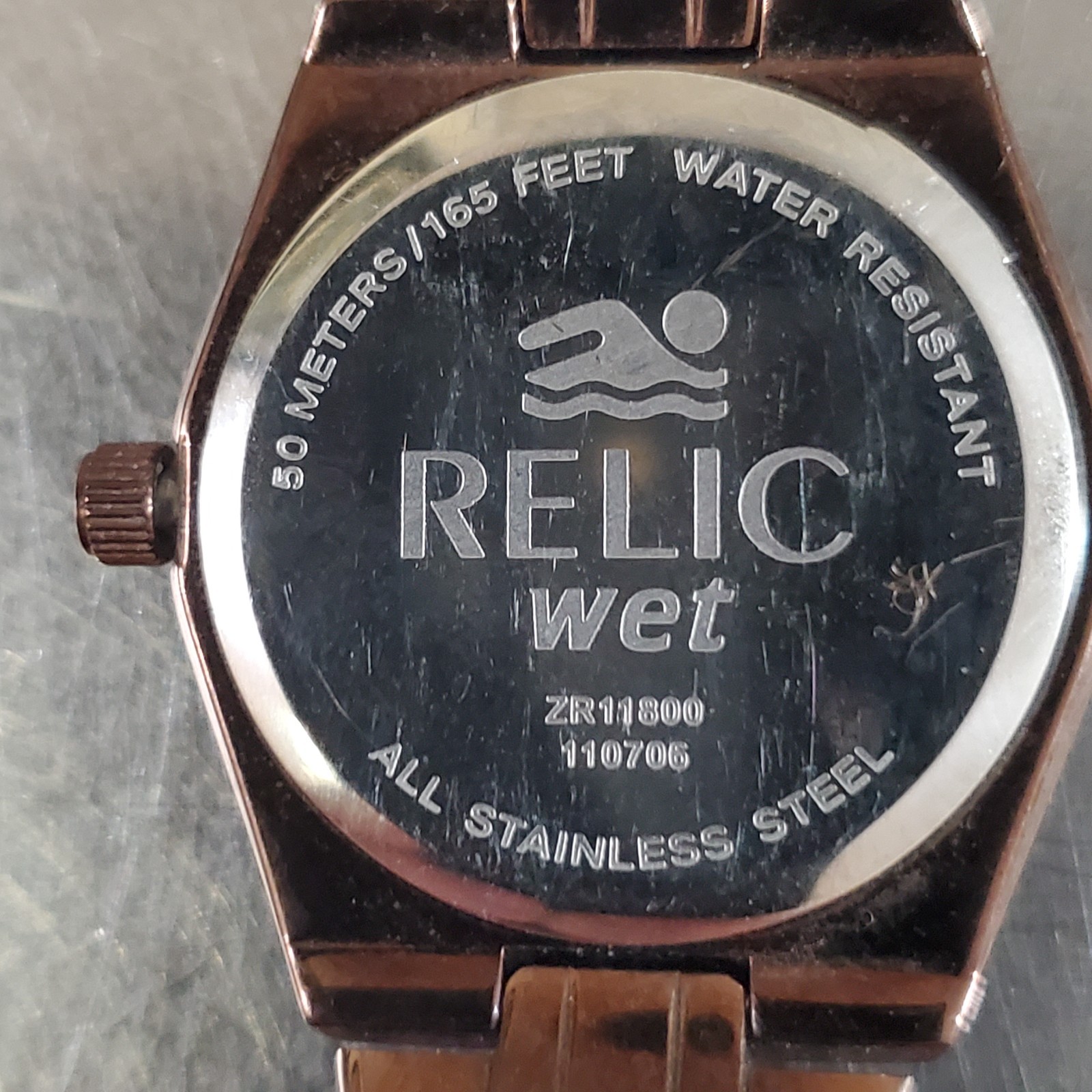 RELIC Watch Women’s Analog Quartz Bronze Tone Date Gemmed MOP 6.25 inch 26 mm