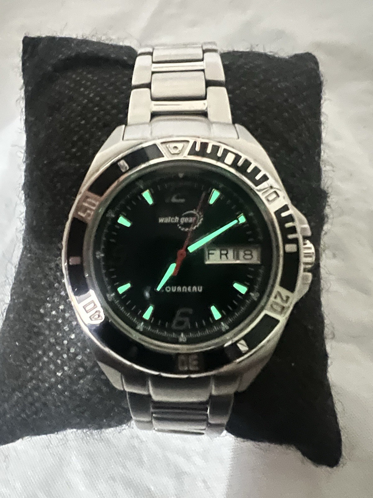 TOURNEAU,Watch Gear,day/date, rotating Bezel,32mm,WR100M,St/Steel ladies