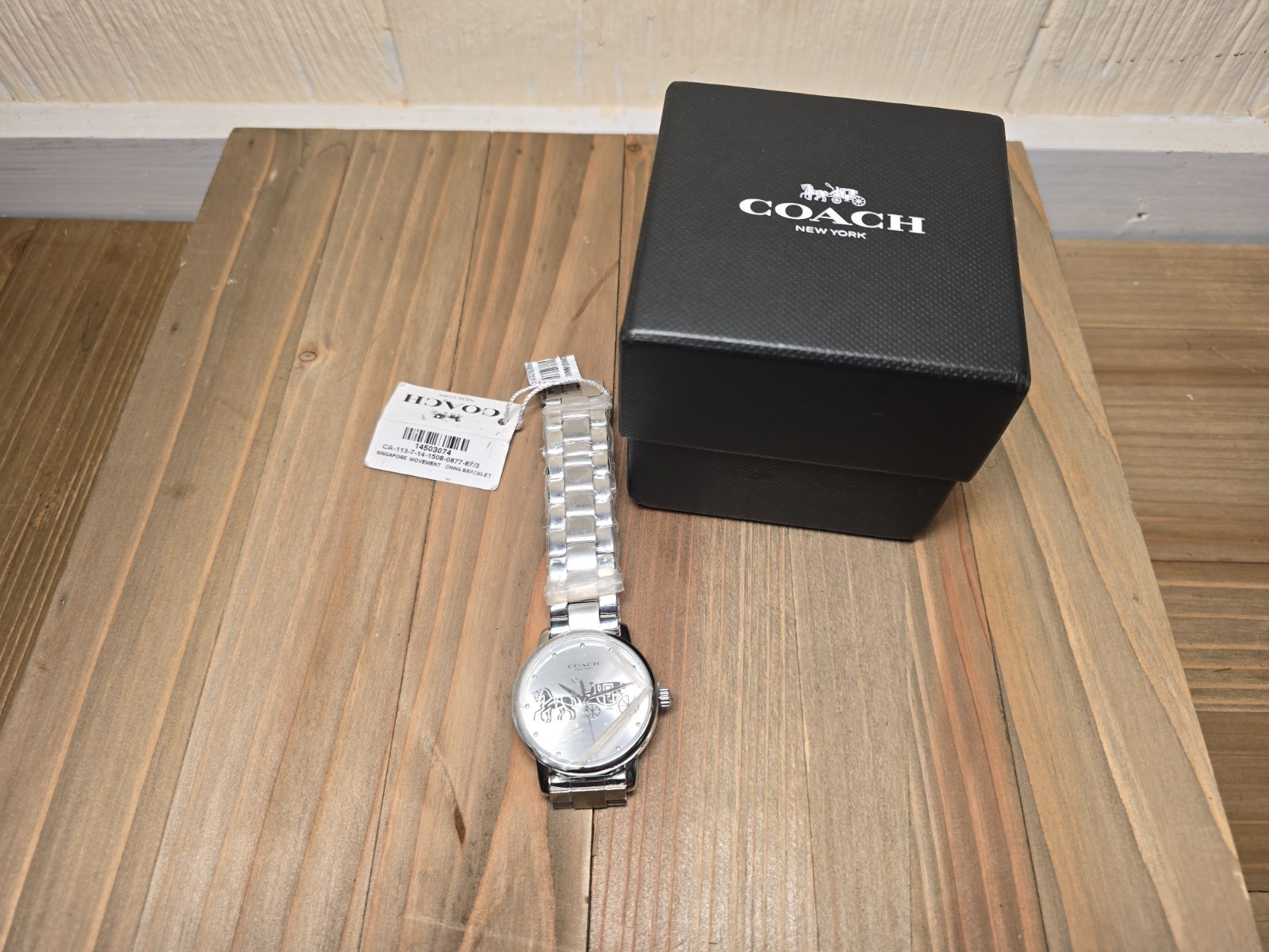 Coach stainless steel women’s watch horse & carriage logo, new with tags and box
