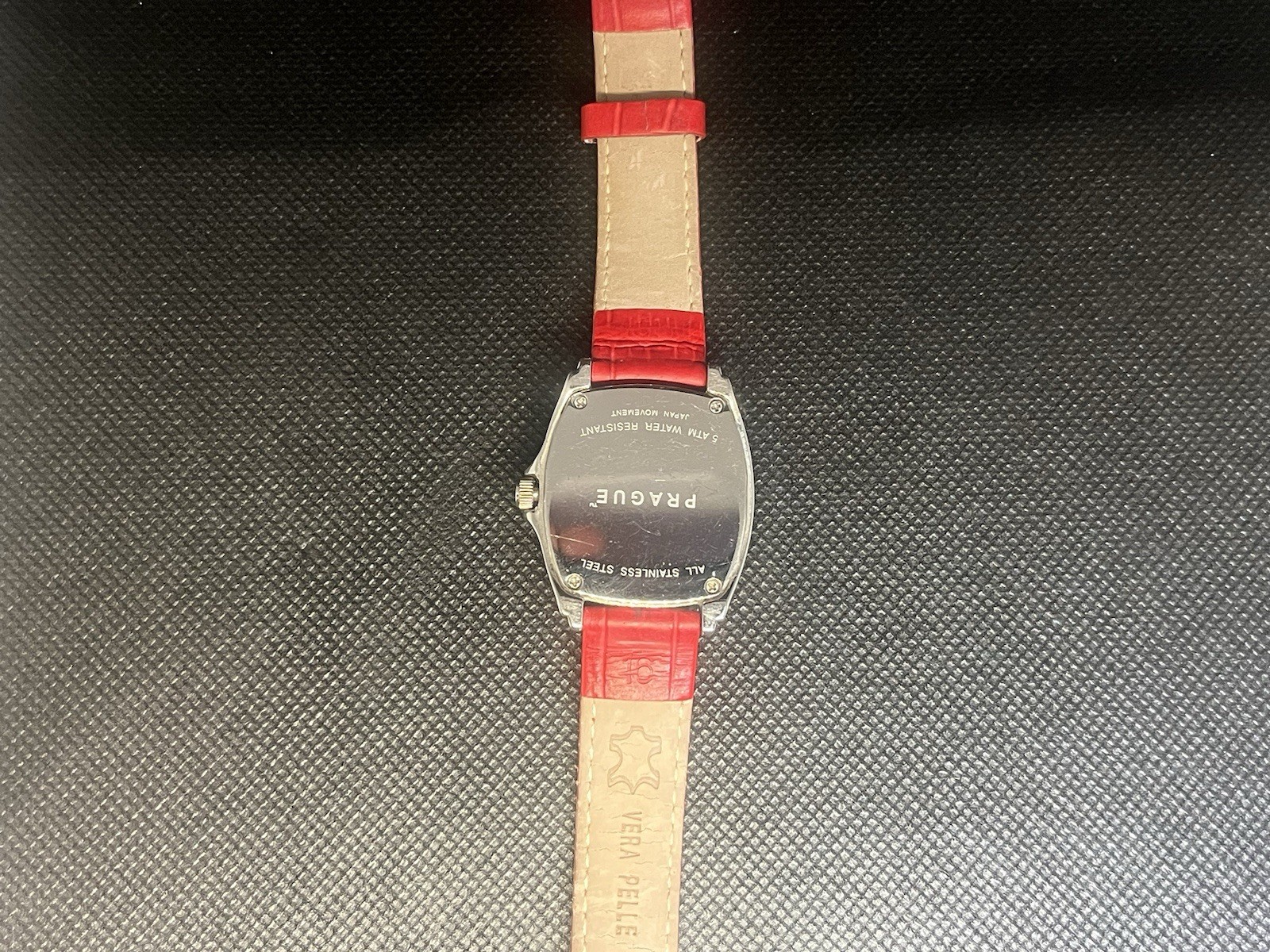 Prague Woman’s Silver Tone Red Dial Red Leather Band 50M Date Watch 41mm x 43mm