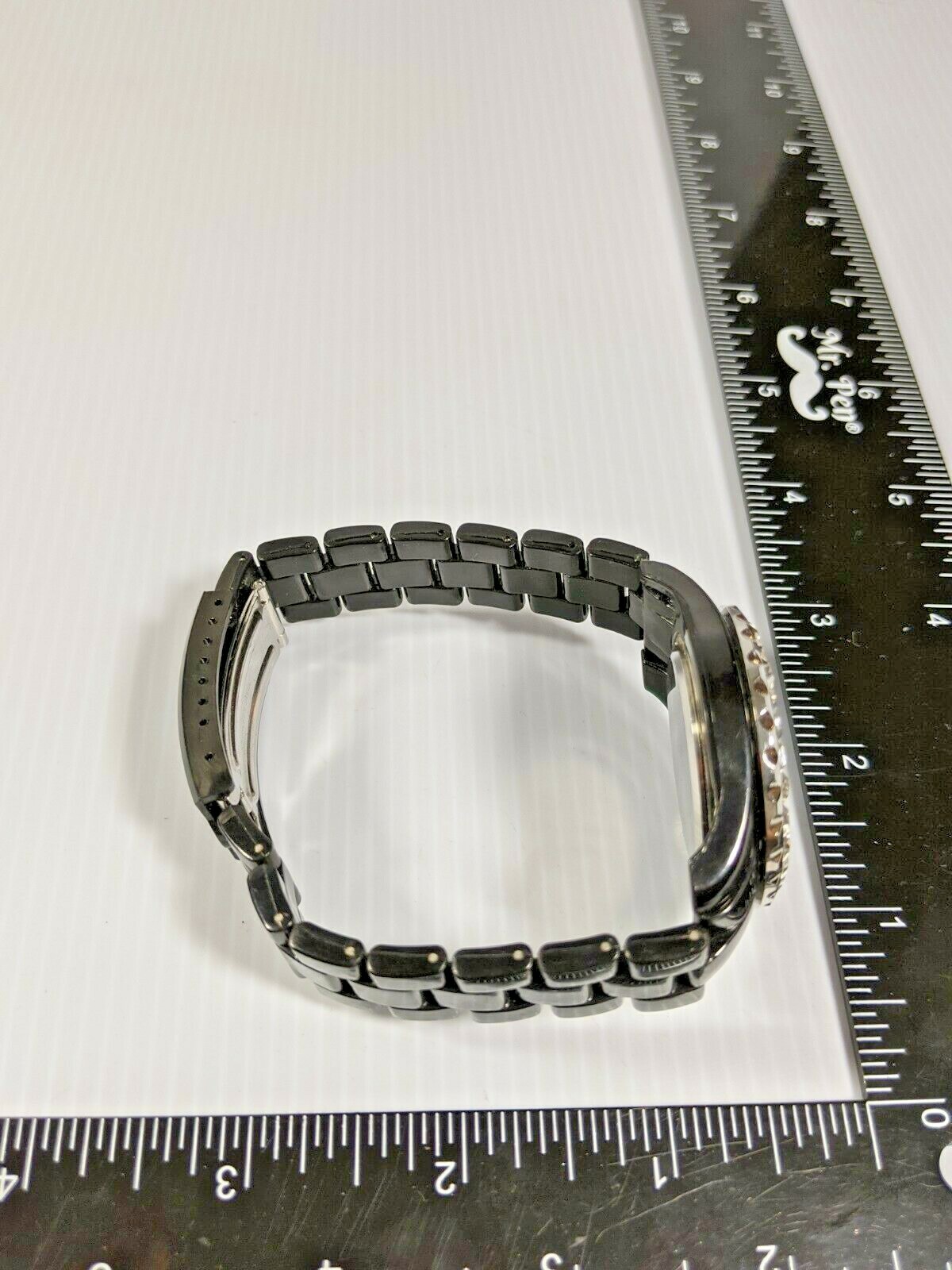 Silver Tone Crystal Peace Sign Black Plastic Band Watch 8.5 Inch
