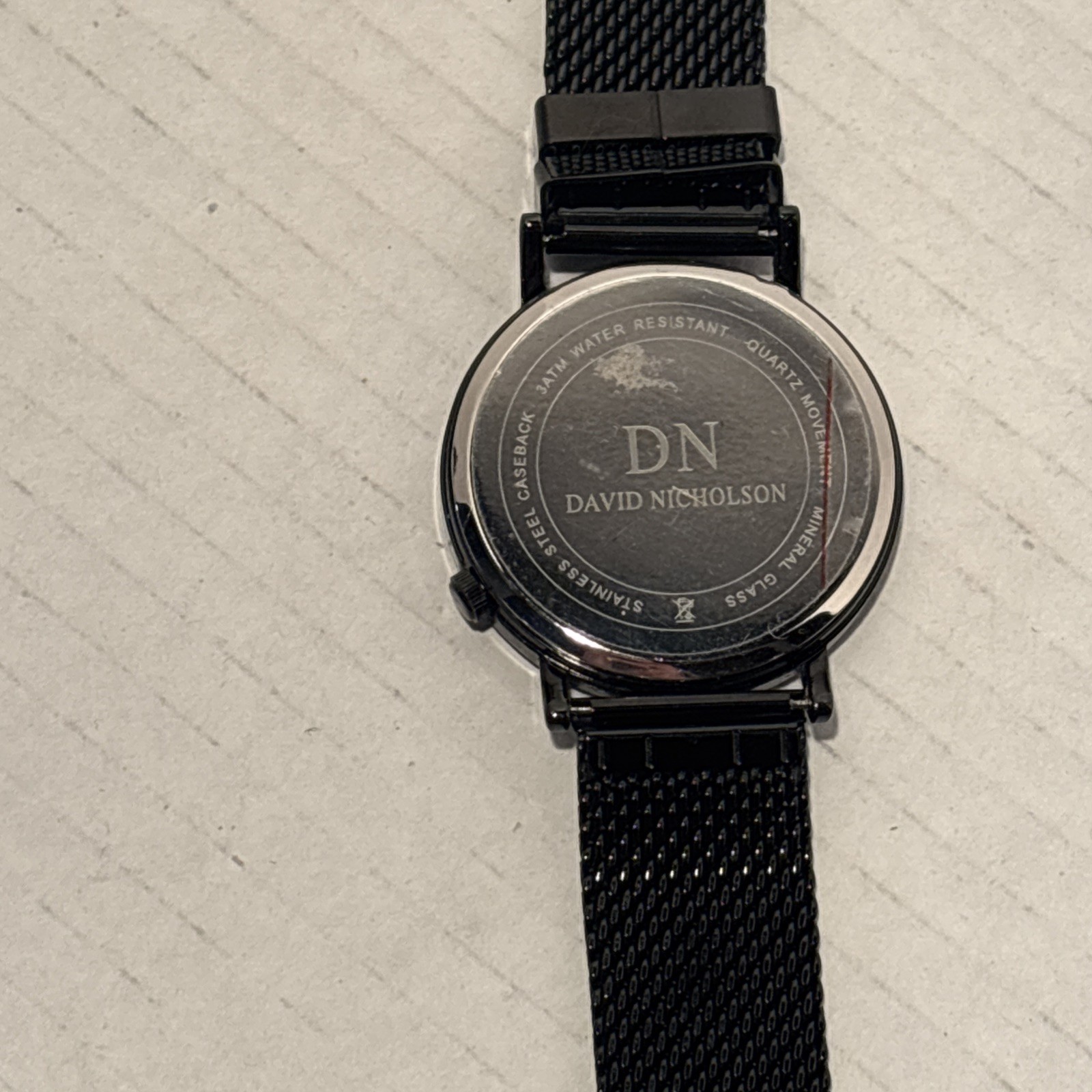 David Nicholson watch black minimalist dial stainless steel mesh
