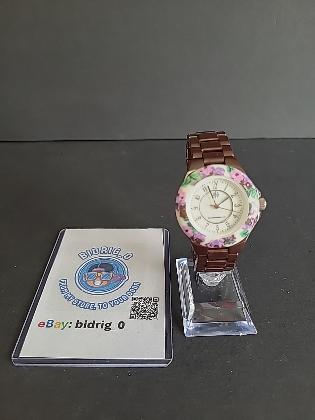 Isaac Mizrahi Ceramic Violet/Purple White Quartz Watch. Floral Design .