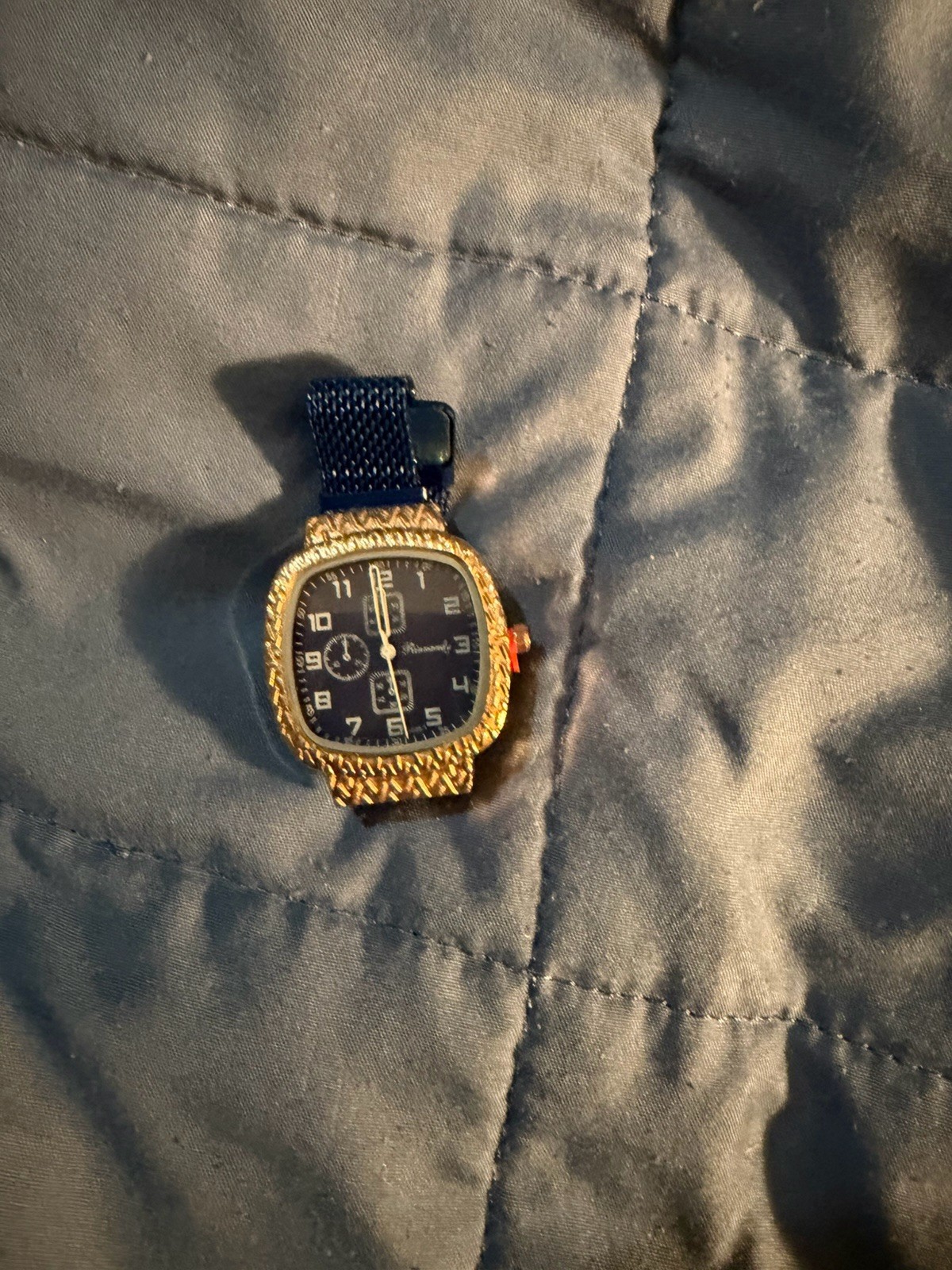 Watch with magnetic band