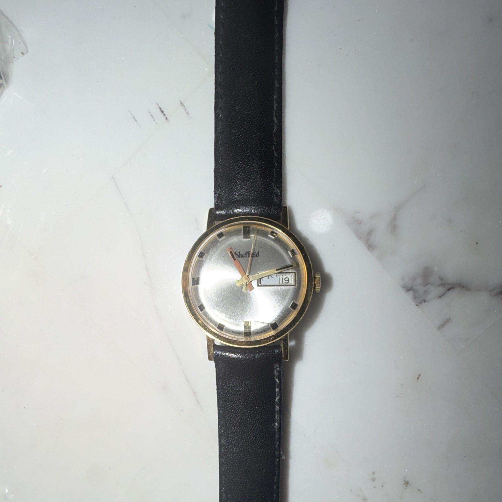 1970s Vintage Sheffield Automatic 17J Day/Date Silver Dial Gold Case Black Strap