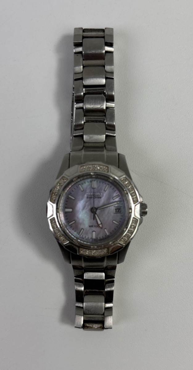 Citizen Eco-Drive Women’s Pink Mother Of Pearl Date Silver Stainless Watch WR100