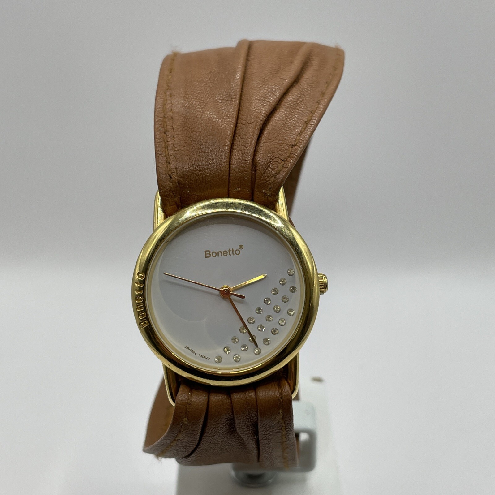 Bonetto watch,ladies.gold case brown leather band with snaps