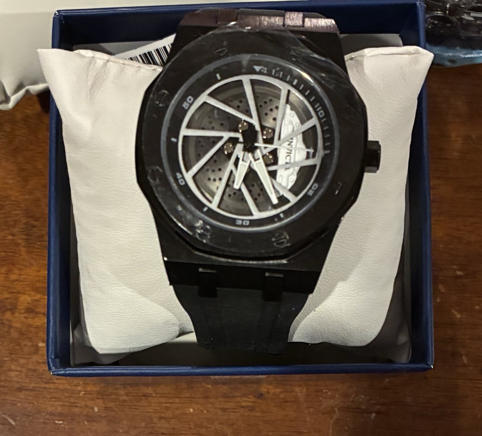 Invicta Speedway Rim Men’s Quartz Watch 42mm Black Skeleton Dial 100m Box
