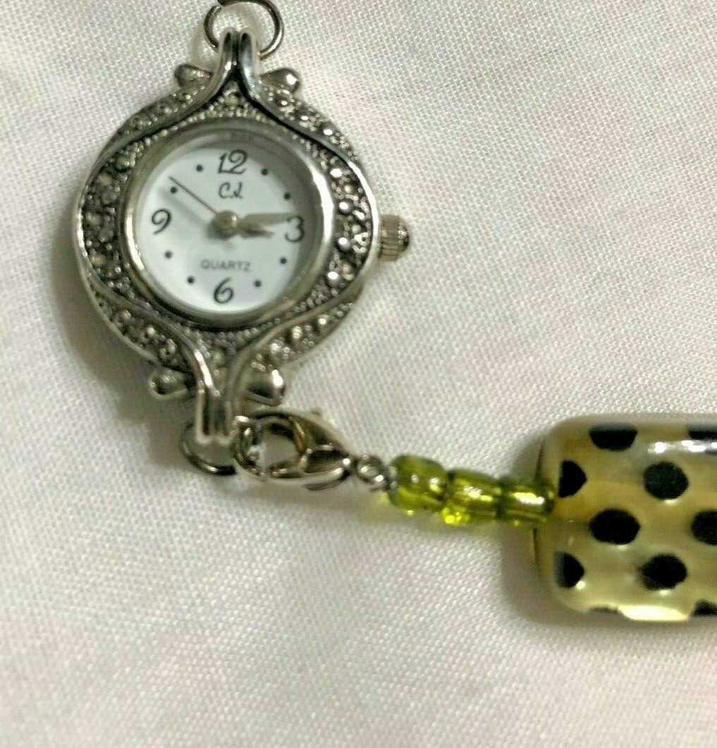 Claudia Jublot watch w glass acrylic bracelet band approx 7 inches