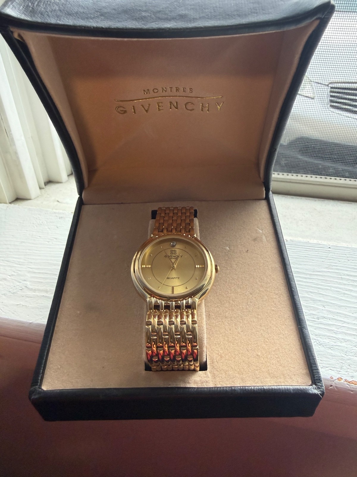 Givenchy Vintage Gold-Tone Quartz Wristwatch Featuring Roundcase, Champagne Dial