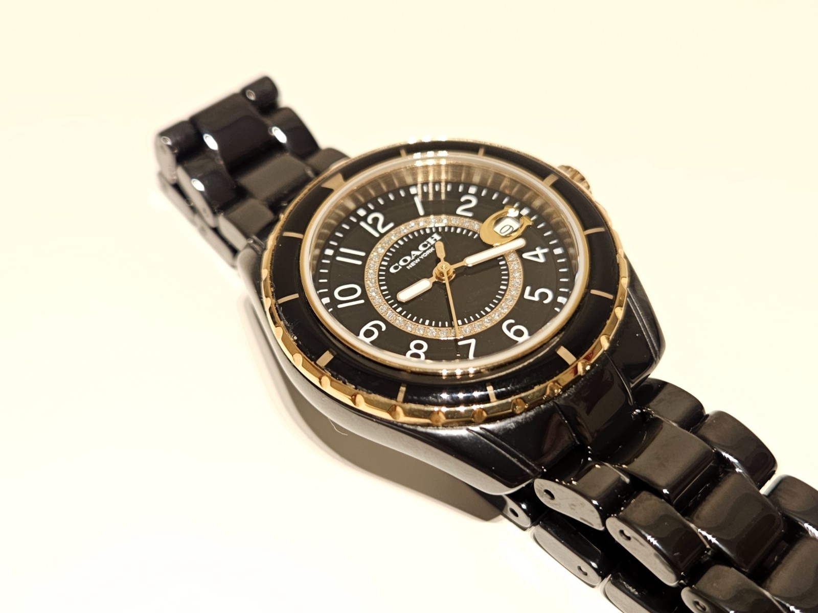 LESS USED LUXURY BLACK CERAMIC LADIES 33mm QUARTZ WATCH “COACH” NEW YORK PRESTON