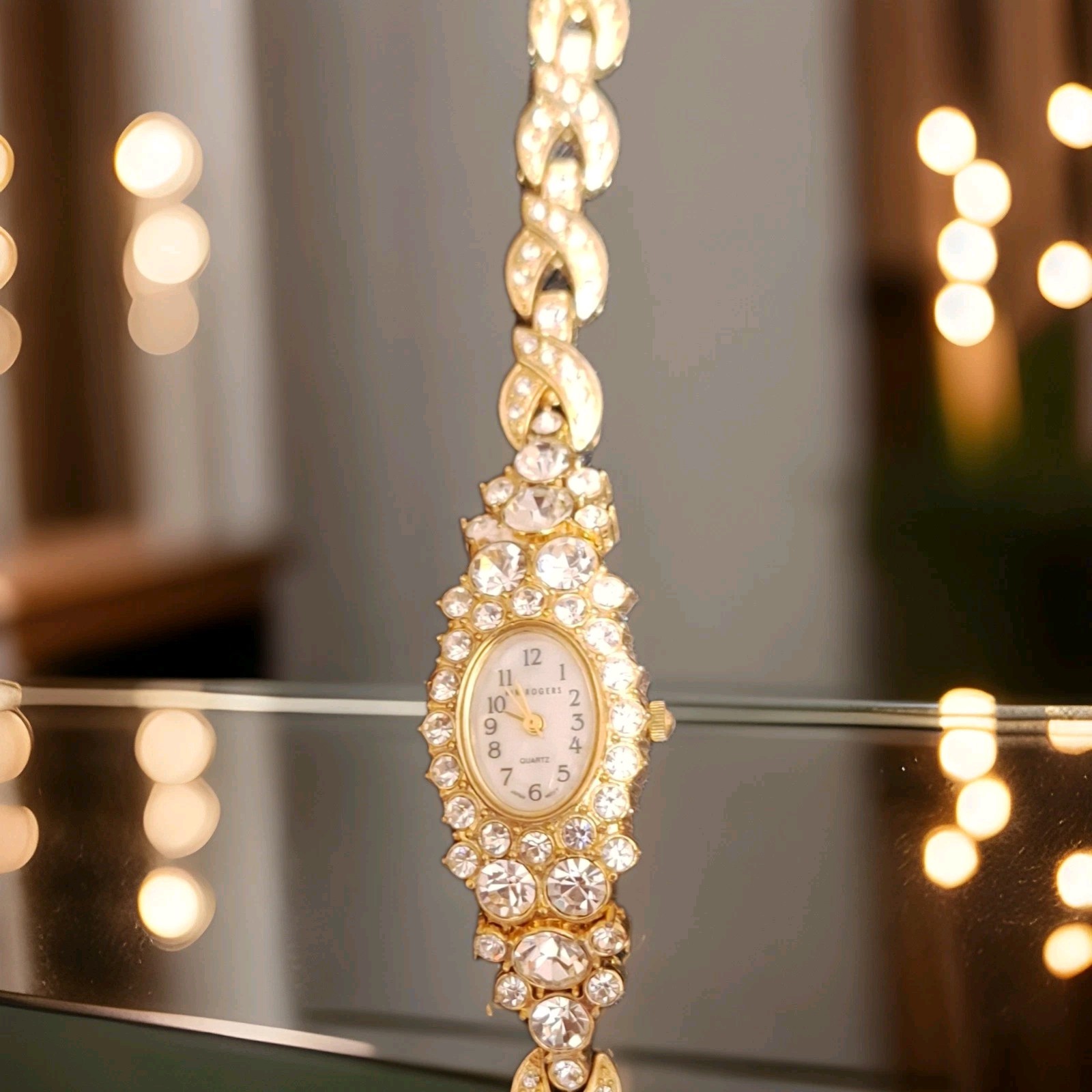 Kim Rogers Women’s Gold Tone Rhinestone Bracelet Quartz Oval Analog Watch