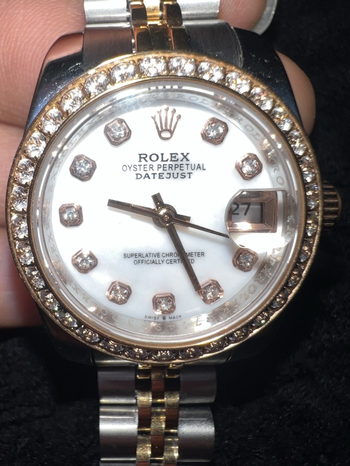 This watch is a 28 mm Rolex Lady-Datejust, model 279381RBR with diamonds