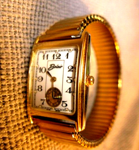 MEN’S BELAIR watch NEVER WORN W/ GOLD TONE FLEX BAND & NNEW BATTERY