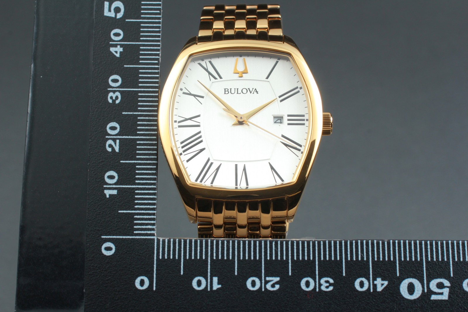 [MINT w/ BOX] BULOVA 97M116 Tonneau Gold Tone Roman Date Quartz 31mm Men’s Watch