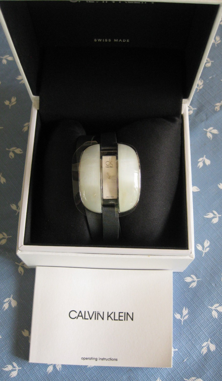 Calvin Klein Treasure Gray Cloth Leather Silver Dial Womens Watch K2E23620