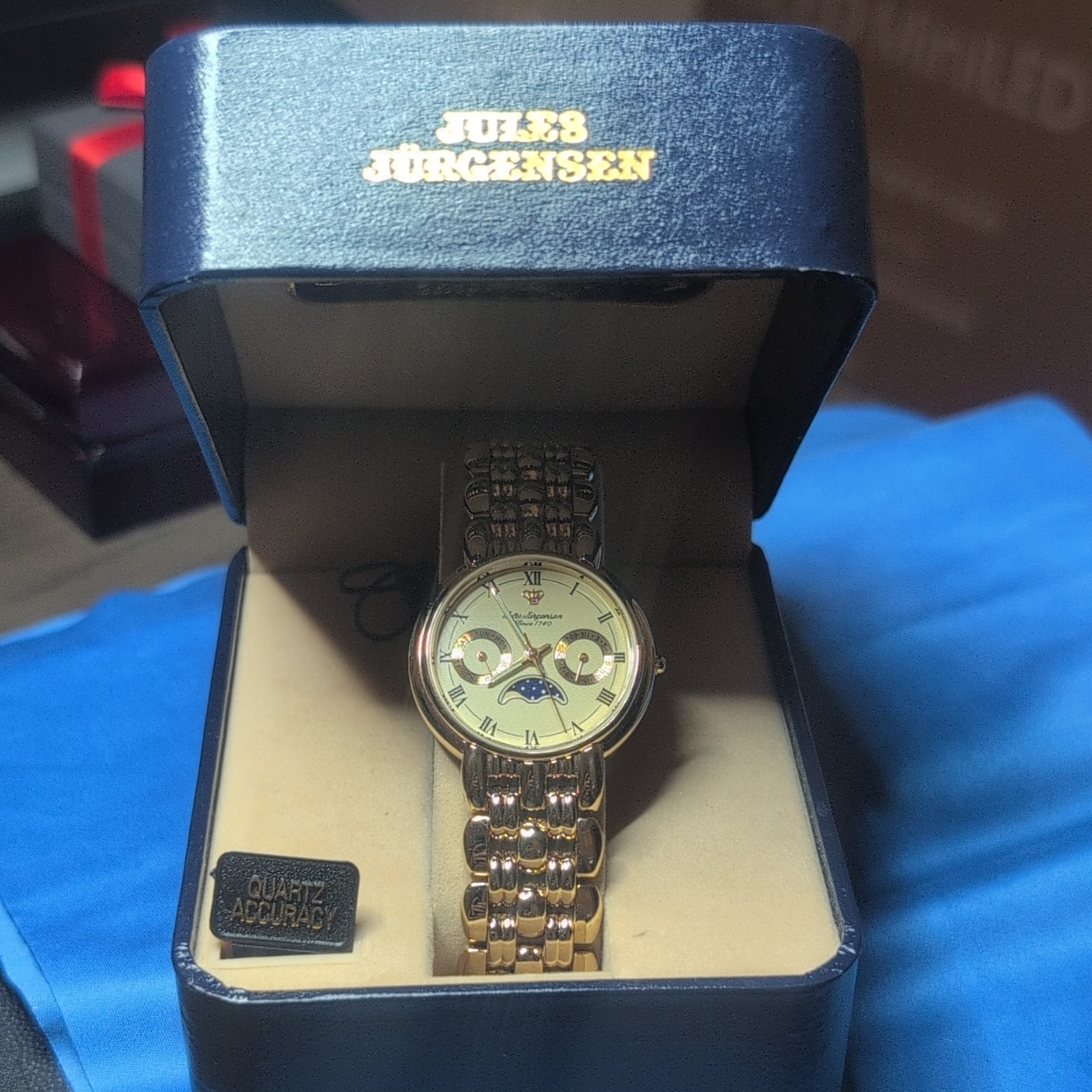 Jules Jurgensen Quartz Moon Phase Day/Date White Roman Dial Gold Bracelet NIB