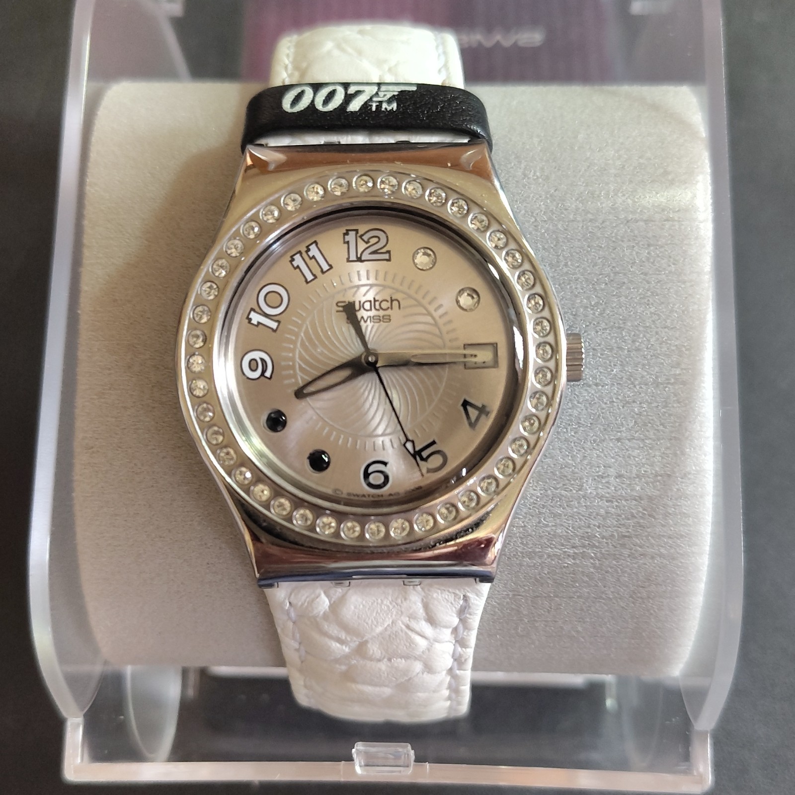 Swatch YLS434 James Bond Villain Quartz Analog Silver Dial White Leather