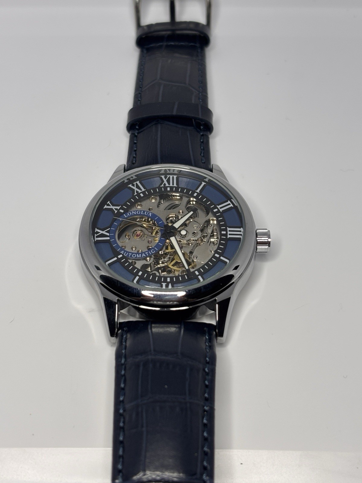 Longlux Automatic Skeleton Dial Roman Numerals Blue Leather Strap SS Watch
