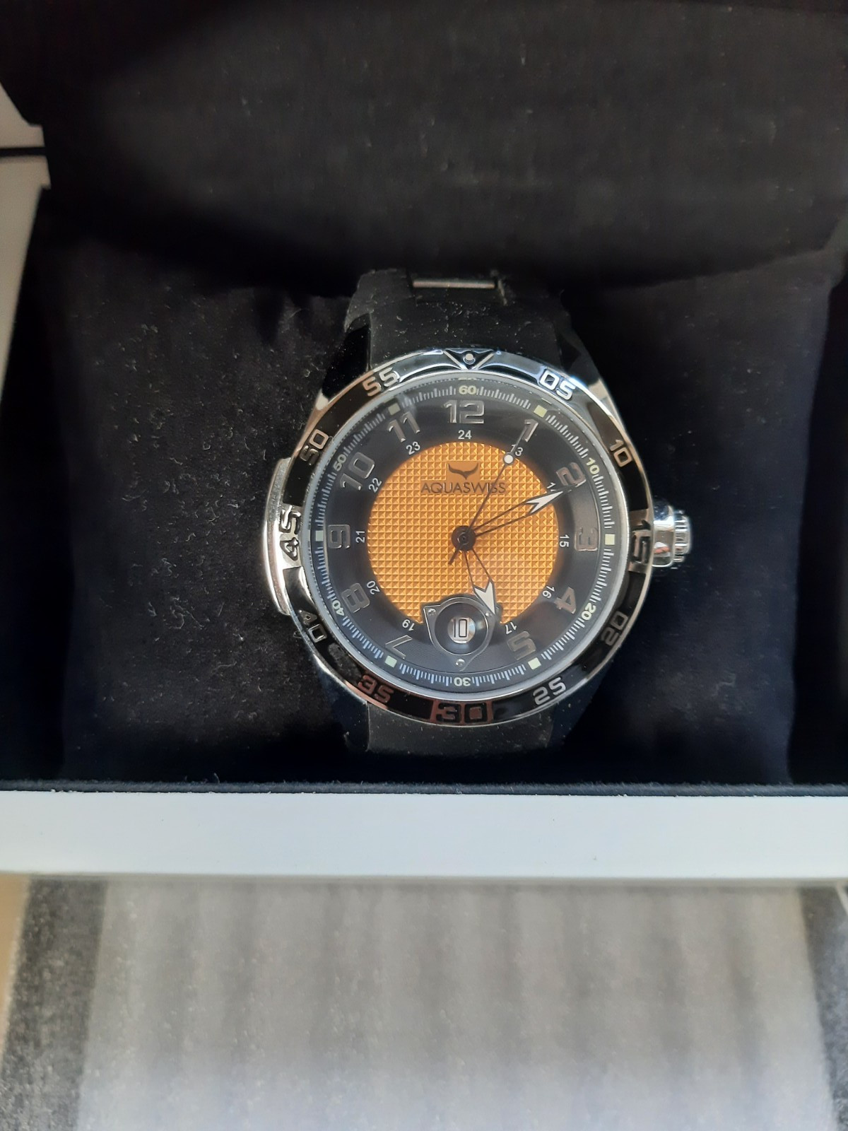 Aquaswiss TRAX Tr09 80G 44MM SS Case Black Silicone Strap Orange Dial
