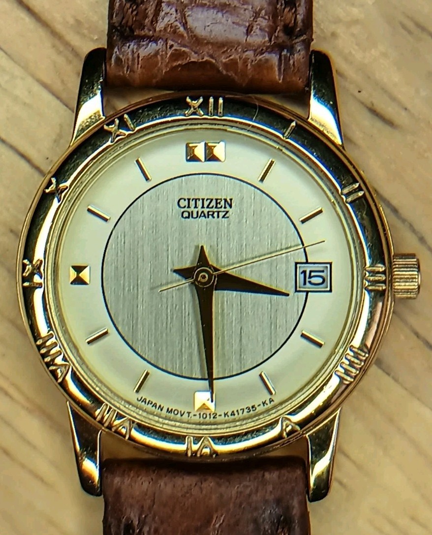 Citizen Ladies Gold Tone Case & Dial 3hand Mvmt Date Roman Numerals Leather Band