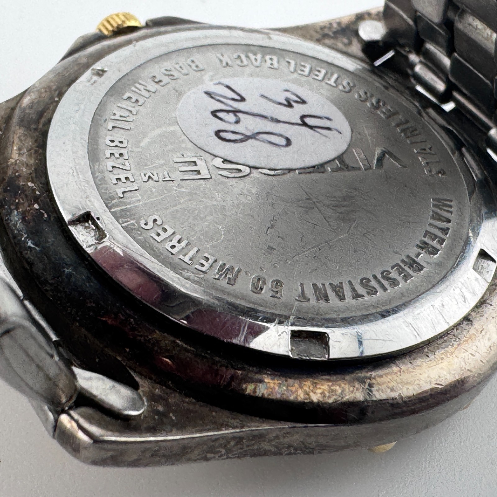 VTG Vitesse Quartz Watch Men 50m Dual Tone Rotating Bezel Date New Battery 7.5″