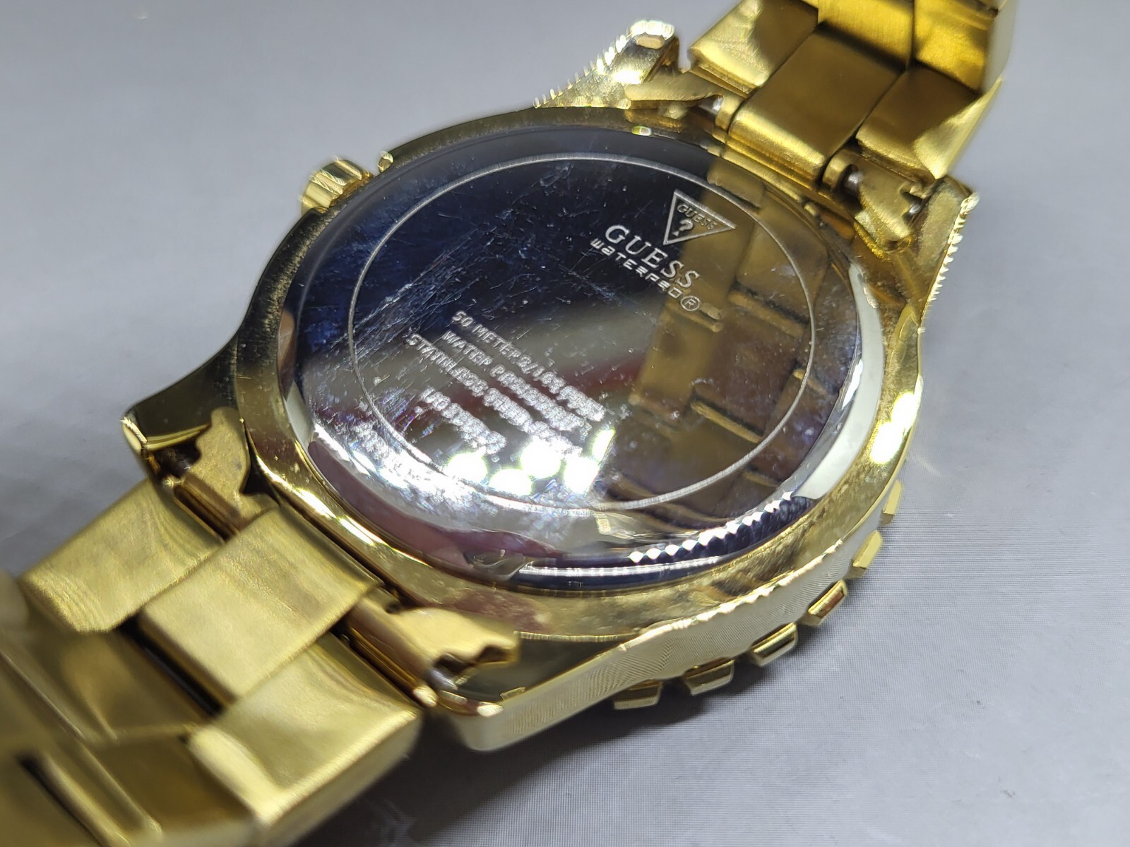 Guess Women’s Wrist Watch Gold Tone Metal with Stones Silver Dial Model U0335L2
