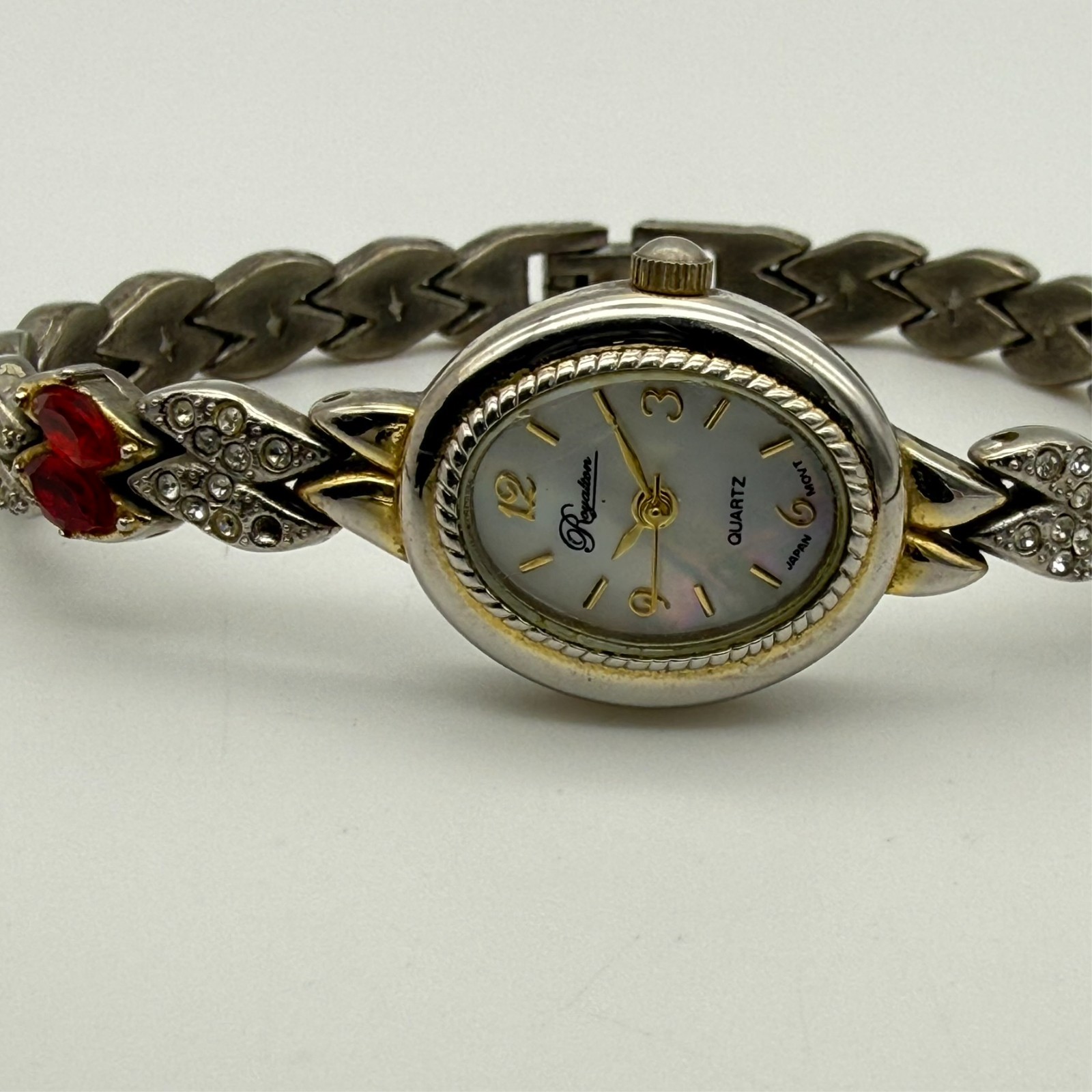 Women’s ROYALTON Gold Tone Petite Oval Bracelet Watch, MOP Dial, Red Crystals