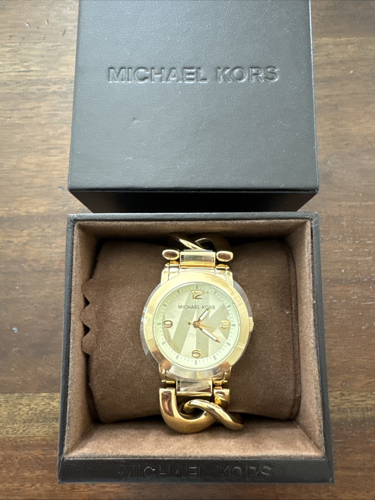 Michael Kors Runway Twist watch (model MK3161) polished gold-tone