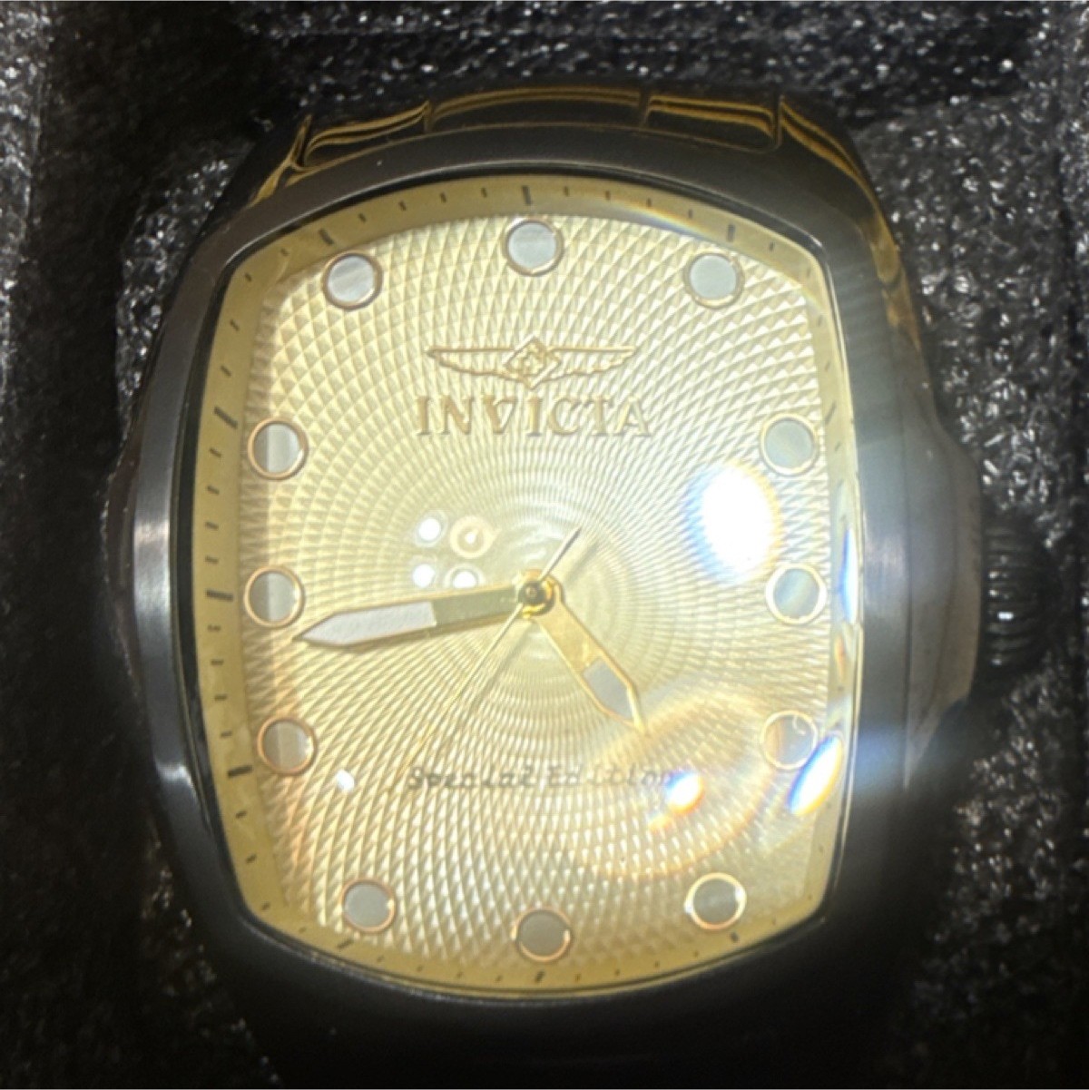 Invicta Men’s Analog Wristwatch Black Case Gold Sunburst Dial Tonneau Shape