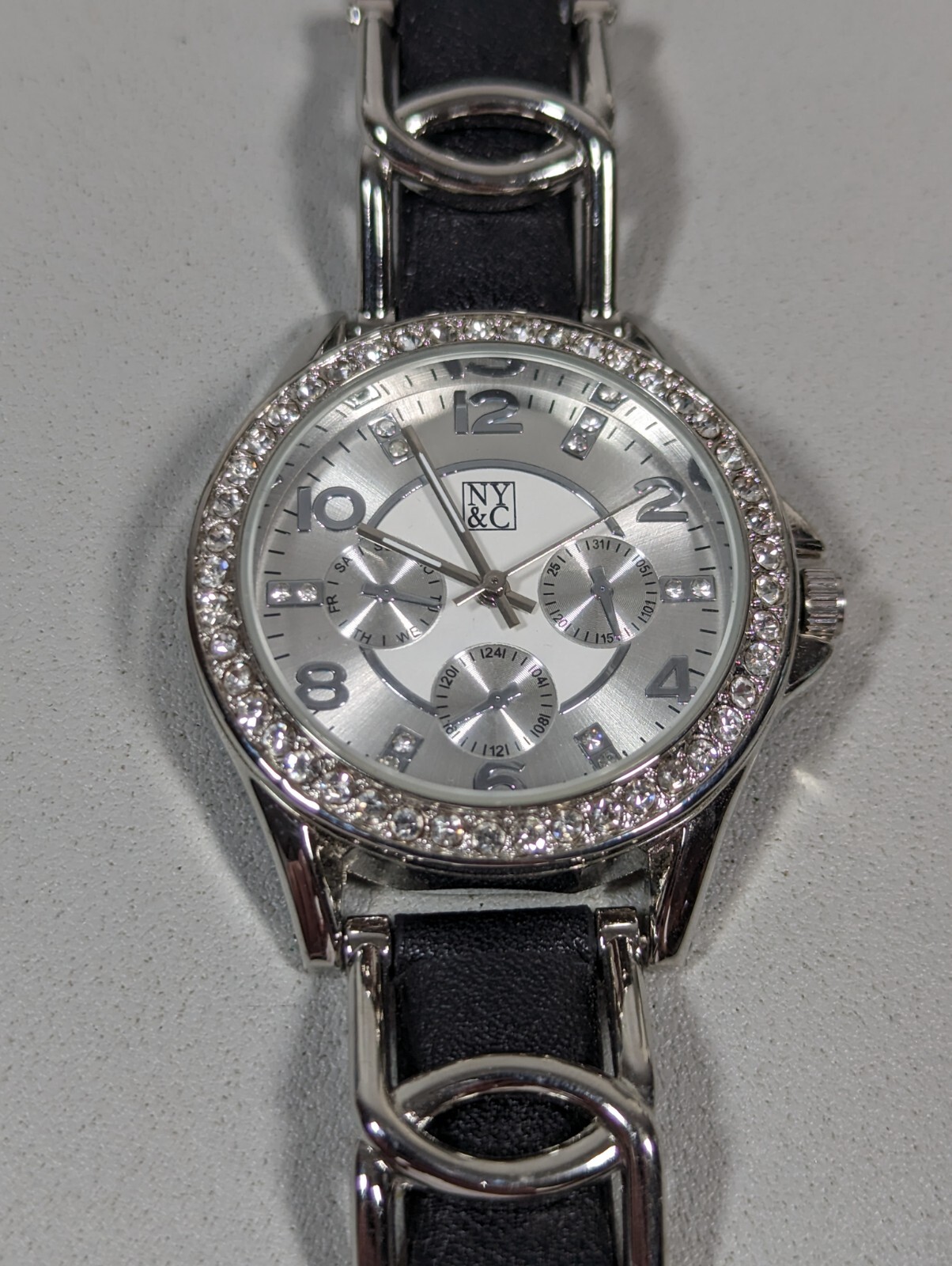 NYC Womans Silver Tone Crystal Accent Round Case Black Band Watch 8 Inch