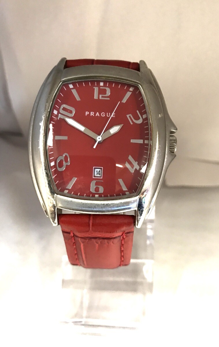 Prague Woman’s Silver Tone Red Dial Red Leather Band 50M Date Watch 41mm x 43mm