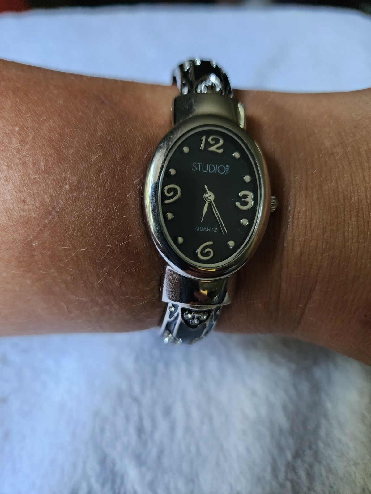 Studio Time Fashion Watch Oval W Black Silver Tone Hinged Cuff Floral Neutral