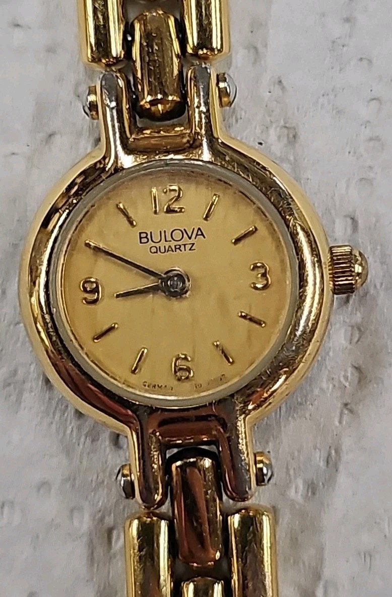 Working Bulova Women’s Goldtone Champaign Dial Wristwatch, New Battery