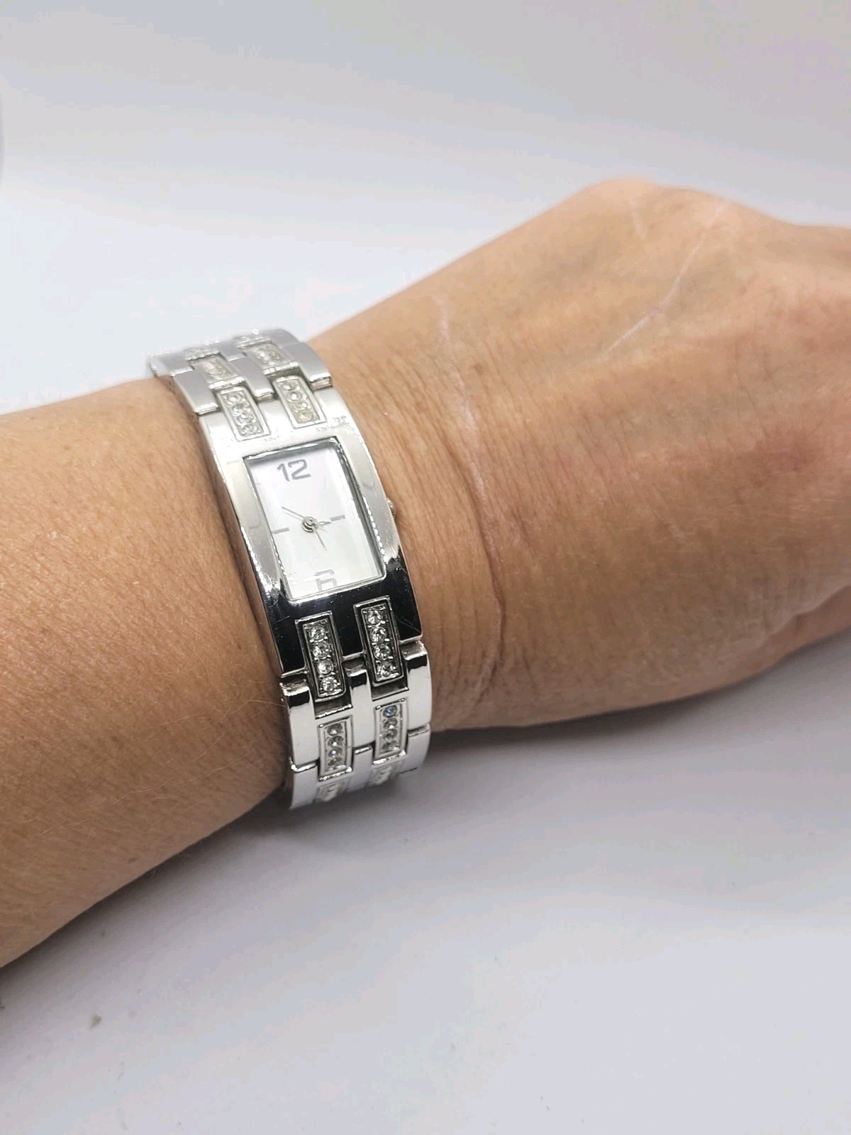 FMD (Fashion Movement Dial)brand ladies’ quartz crystal accents Braslet 6.5in.