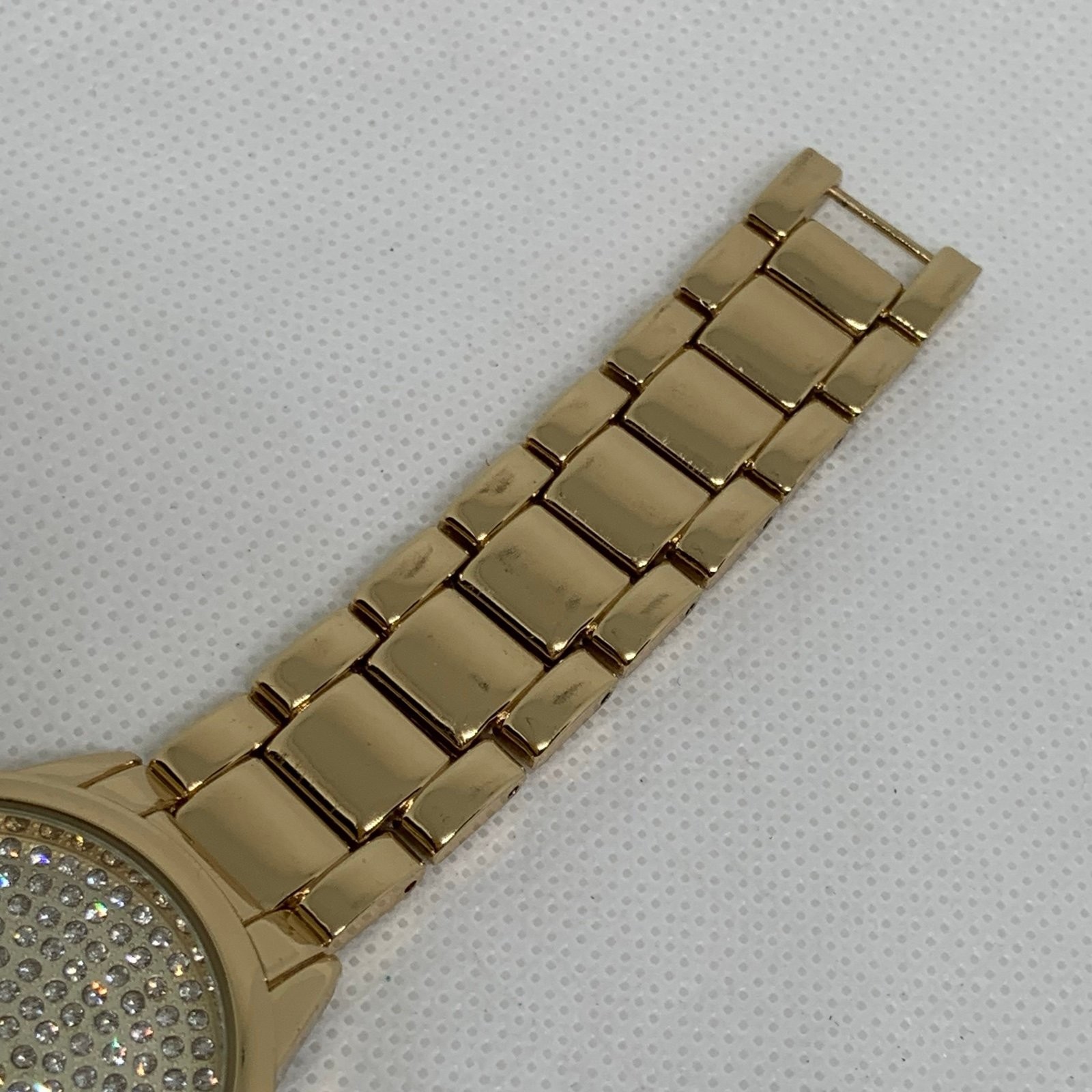 Aldo gold tone women watch 35mm round quartz analog iced dial 7.5” running