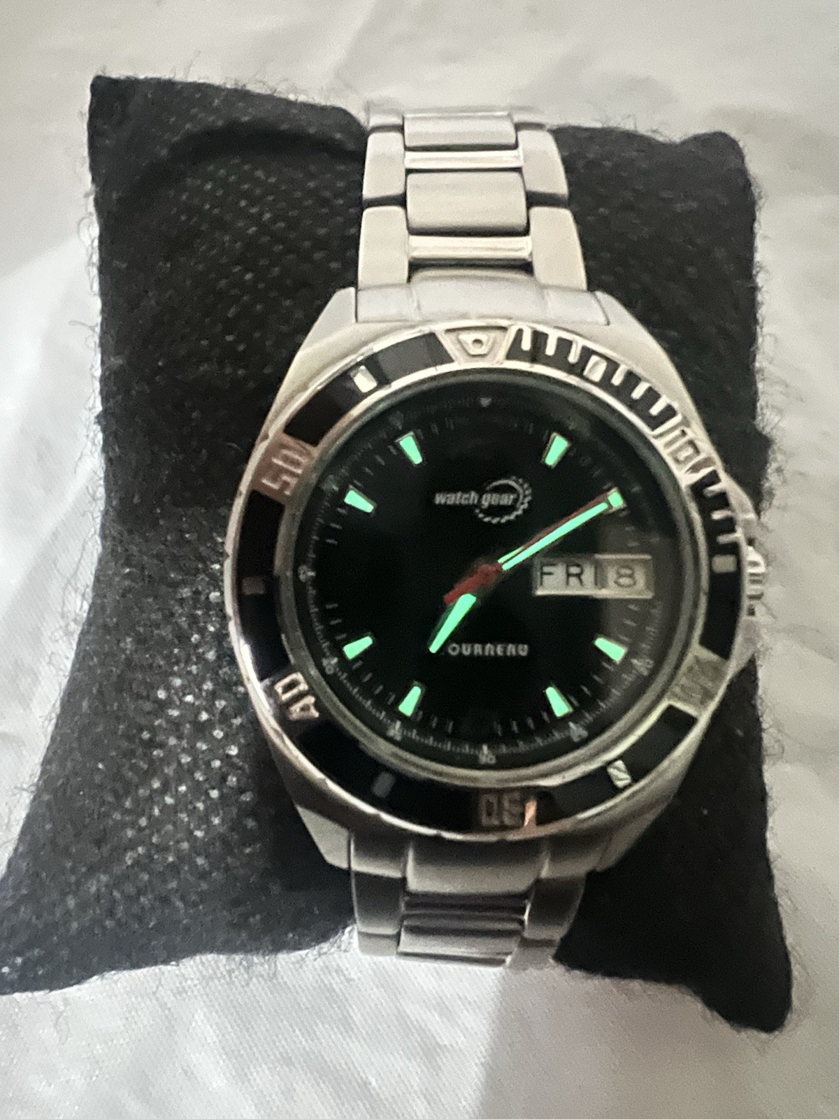 TOURNEAU,Watch Gear,day/date, rotating Bezel,32mm,WR100M,St/Steel ladies