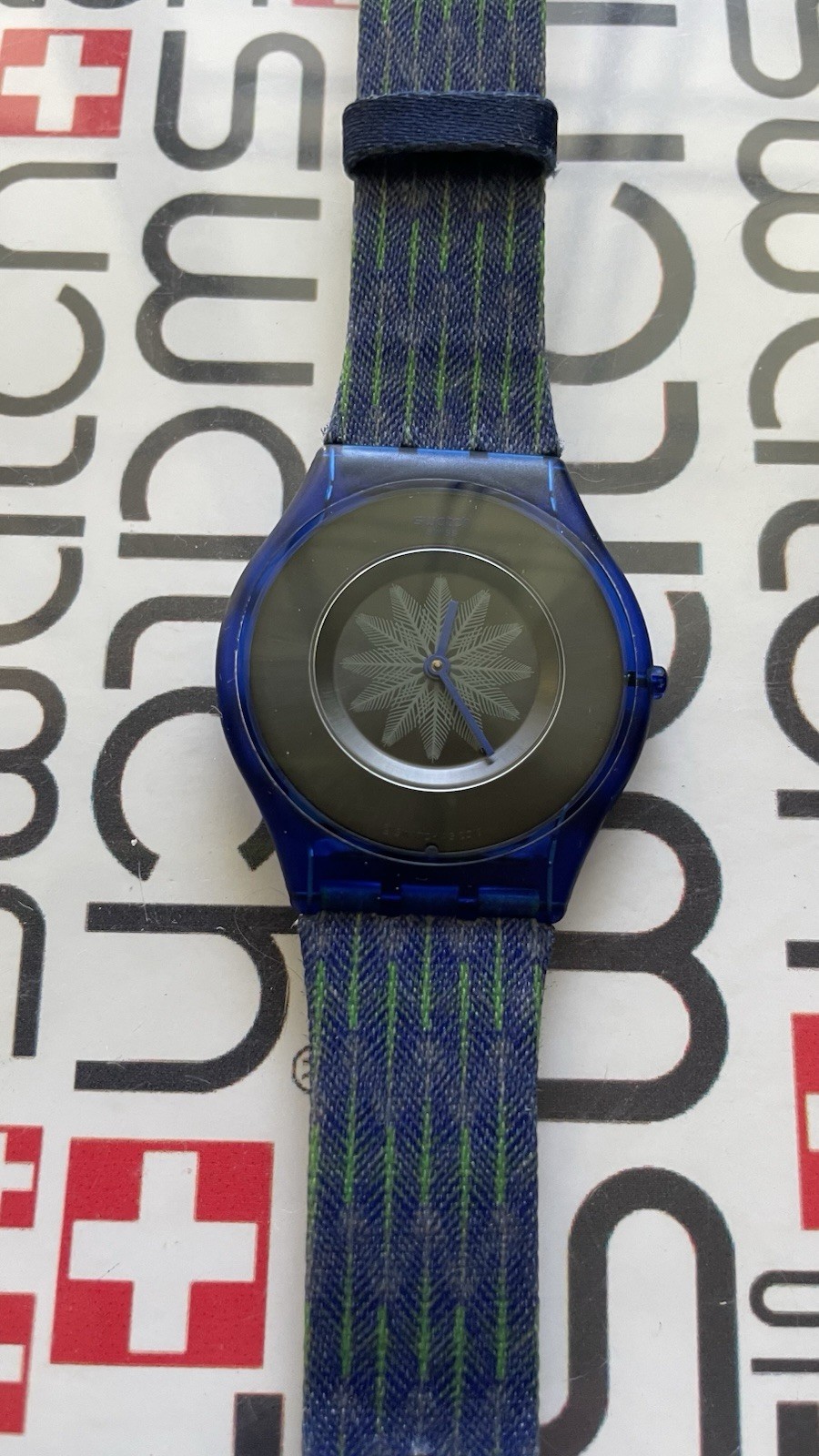 Swatch Breezy Feather SFS102 2014 Skin 34mm X 3.9mm Textile Over Leather