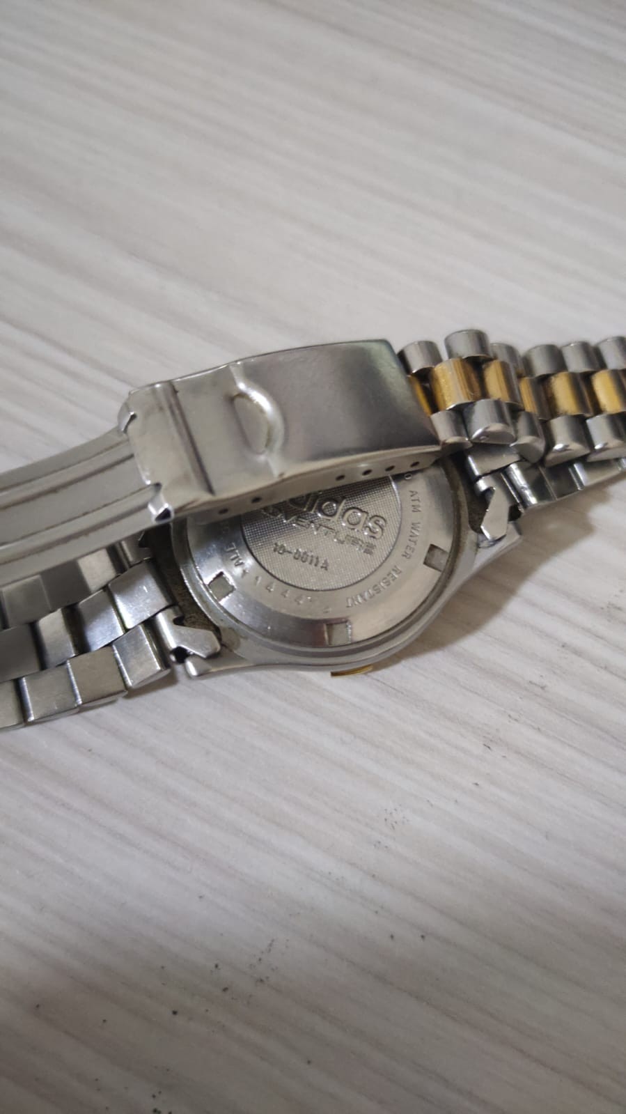 ​”Vintage Adidas Adventure watch with scratches. Not working, for repair/parts.”