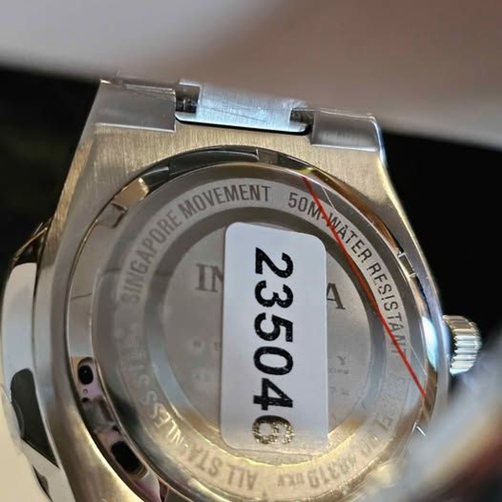 Invicta stainless steel black dial quartz. New in box!